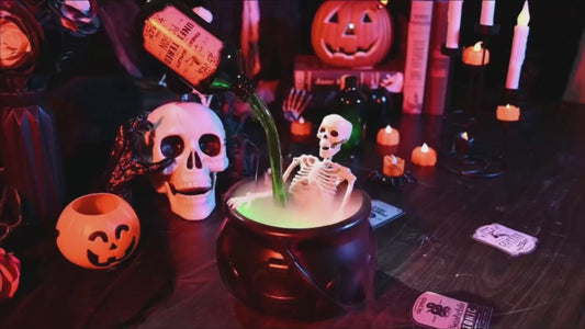 Halloween floating potion bottle diffuser with green fog inside wizard bowl